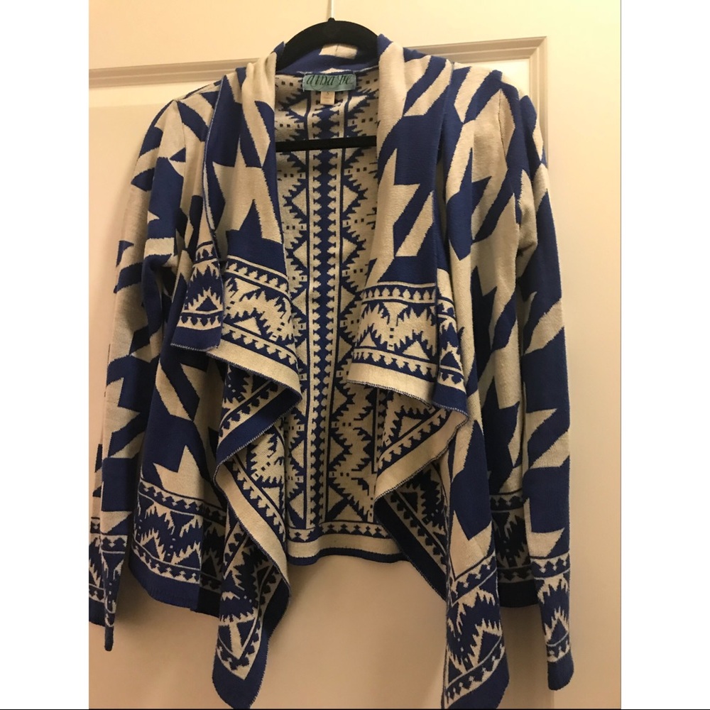 Francesca’s blue and white patterned cardigan